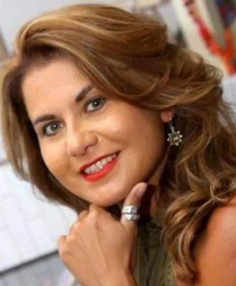 Portrait d’Isela Geinoz, souriante.